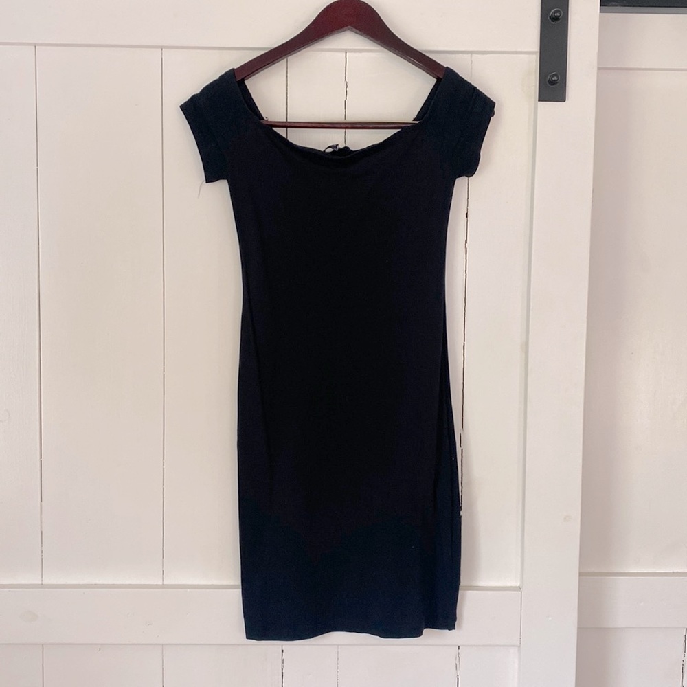 Express black bodycon off the shoulder midi dress.